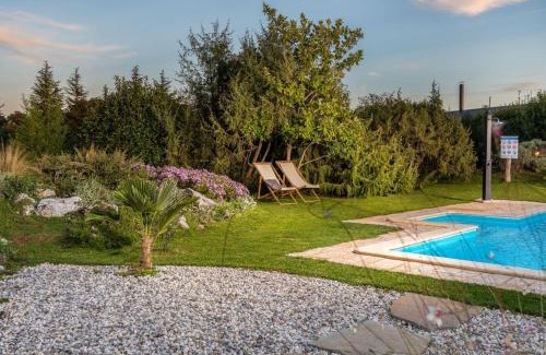 Heki Villa | Holiday house Dorstari by Villsy - large garden with pool, playground for kids and adults