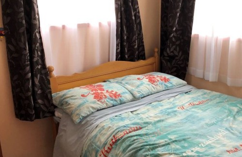 Waitarere Beach House | Holiday House with additional Sleepout to Rent Separately