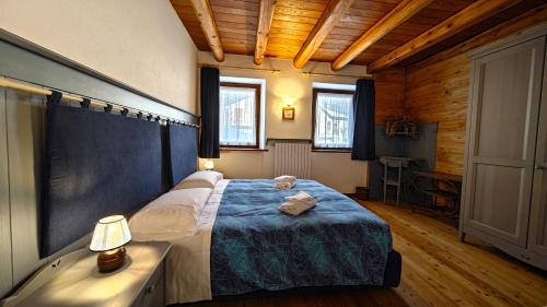Pragelato Apartment | Hostdomus - La Posta apartment