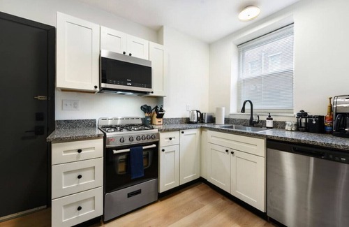 Lower Lawrenceville Apartment | ★ HostWise Stays ★ Pet Friendly, King Bed, Private Entrance, Butler St.