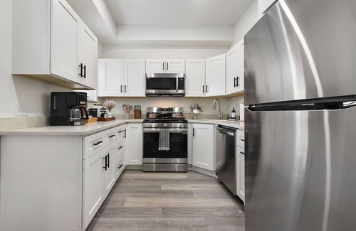 Lower Lawrenceville House | *HostWise Stays* - Pet Friendly, Patio, Great for Long Stays!