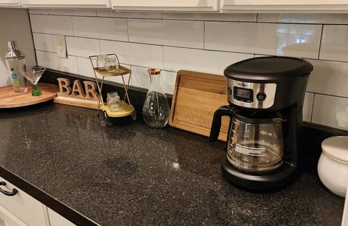 West Omaha House | Hot Tub | King Beds | 65-inch HDTV | BBQ Grill