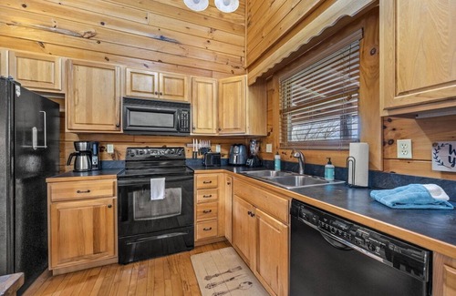 Sevierville Cabin | Hot Tub, Stunning Views, Indoor/Outdoor Pools, Game Loft & Mini Golf