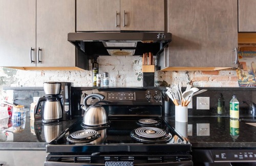 Ypsilanti Apartment | Hotel California - KING BED LOFT