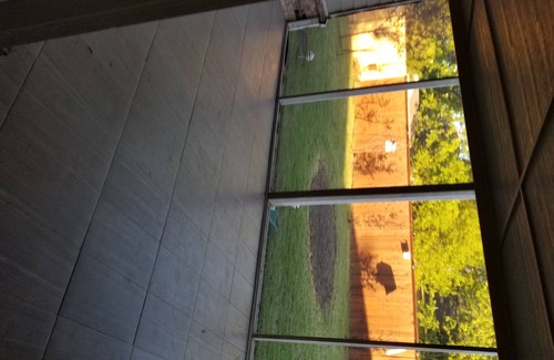 Tulsa County House | House outdoor screen porch