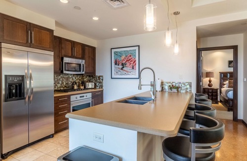 Downtown Steamboat Springs Condo | Howelsen Place B211 | Downtown Condo | Private Heated Garage | Fire Pit With Views