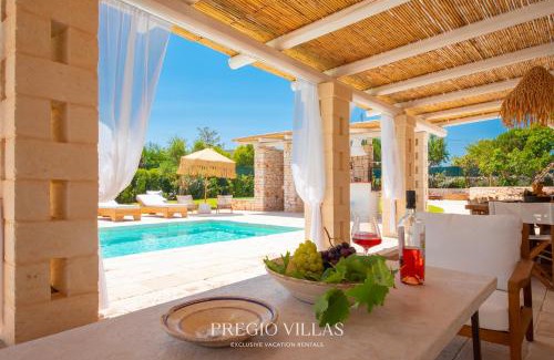 Martina Franca Villa | I Trulli del Tarassaco with private pool by Pregio Villas