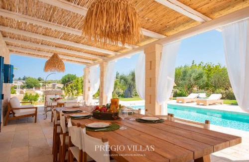 Martina Franca Villa | I Trulli del Tarassaco with private pool by Pregio Villas