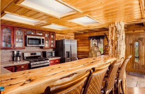 Bayfield House | Iconic 4 BR 5 Ba Log Chateau on Vallecito River & Lake, 12,000 to 14,000 Mtns.