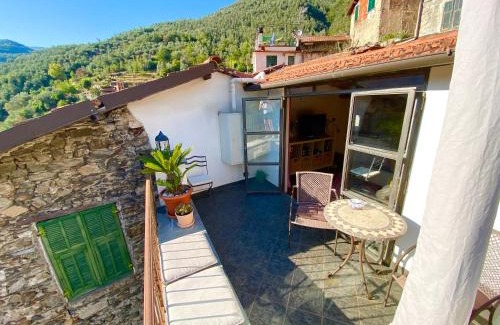 Pigna Villa | Iconic Italian Townhouse w Rooftop Terrace & Mountain View, Pigna