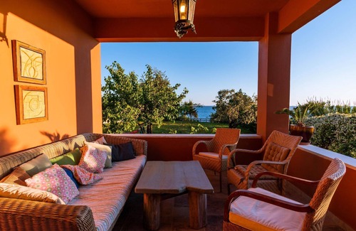 Agios Matthaios House | Idyllically situated and luxurious villa with a veranda and a gazebo
