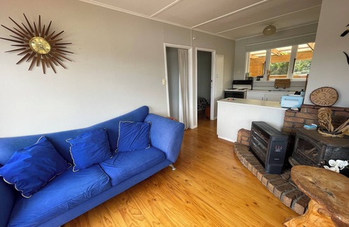 Doubtless Bay Cottage | IkaRua Cottage - Idyllic waterside cottage with stunning views of the harbour.