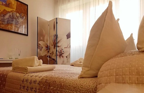 Quartiere XX Ardeatino Bed & Breakfast | Il Gufo e la Gattina - Bed and Breakfast