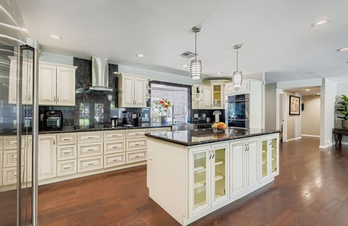 Rainbow Park House | Immaculate single story 4 bedrooms with pool and hot tub