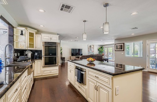 Rainbow Park House | Immaculate single story 4 bedrooms with pool and hot tub