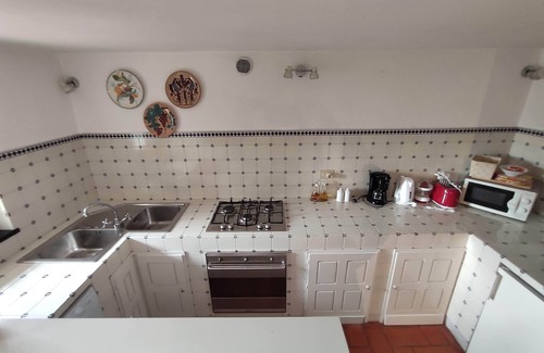 Cisano sul Neva Apartment | Independent apartment with a fabulous patio (Casa Penny)