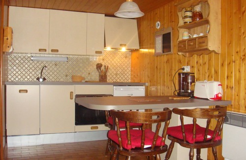 Le Grand-Bornand Apartment | Individual chalet facing the Aravis, south garden level with terrace and lawn