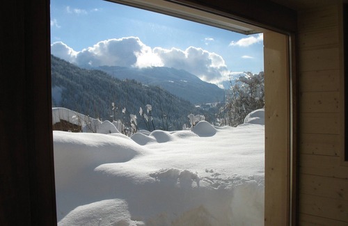 Le Grand-Bornand Apartment | Individual chalet facing the Aravis, south garden level with terrace and lawn