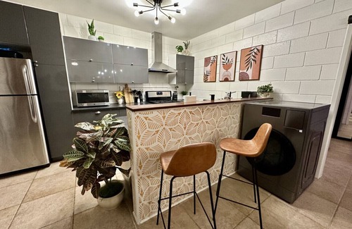 Sand Section Apartment | Industrial Boho Beach Bungalow