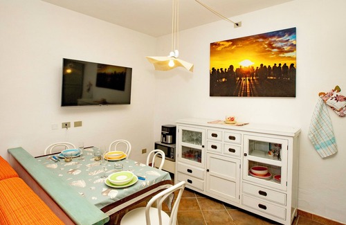 Trinita d'Agultu e Vignola Apartment | Intimate sea-view apartment on the cliff with veranda next to Li Cossi