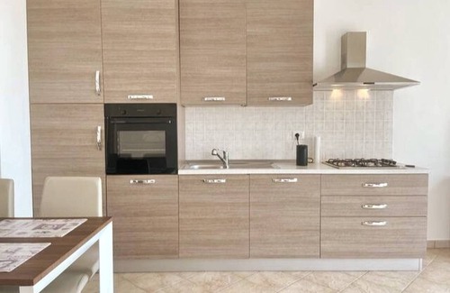 Paduledda Apartment | Isola Rossa apartment with breathtaking sea view
