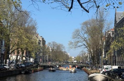 Grachtengordel-West House | JoyJoyJoy the Royalty ecolicous design house in a historic Canalhouse from 1618 with 2 bedrooms with top floor views over the canals