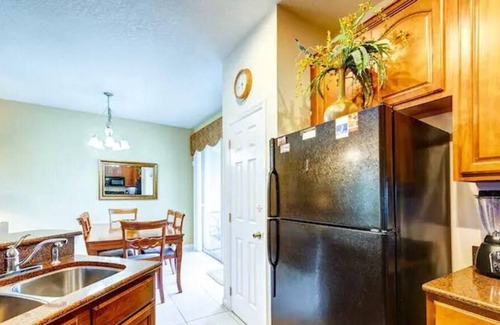 Trafalgar Village House | Kg Bd Retreat Pool, Movie Theater, and Fitness Center