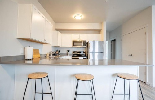 Vancouver Apartment | King Bed Boho Design near Local Coffee Shop & Grocery Store