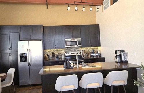 Roanoke Apartment | King Bed, Free Garage Parking - Brick Loft in Downtown Roanoke