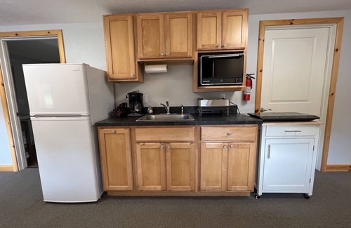 Paradise Hotel | King Family Suite - Tahquamenon Suites Paradise MI