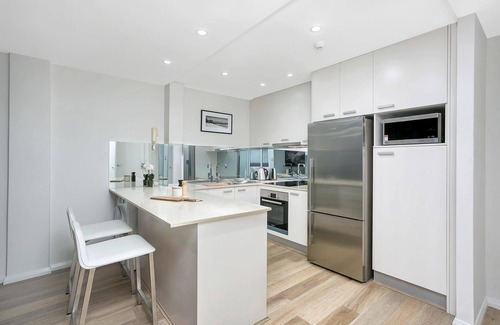 Kirribilli Apartment | Kirribilli - CBEL2 - Carabella - Top-Floor 1BR with Harbour Views Balcony Near Kirribilli Village