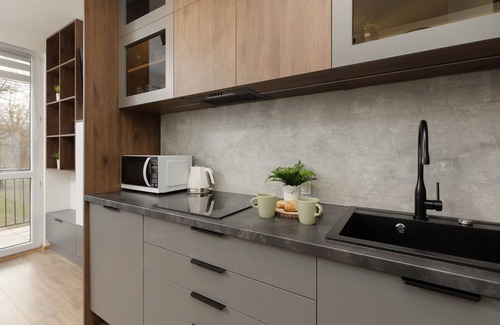 Ursus Apartment | Kolorowa Studio Apartment by Renters