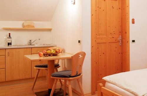 Nalles Apartment | Kreuzwegerhof Nals-historic living with natural Pool Oasis for families, nature lovers and active travelers