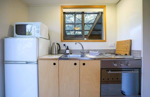 Lake Okareka Apartment | Kundaniwas | Lake Okareka Tiny House + Lake Views