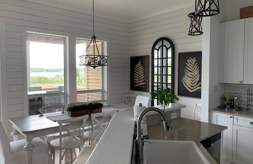 Gulf Shores House | “Lagoonfront Privacy at its Best: Heated Pool, Hot Tub, & Kayaks Included”