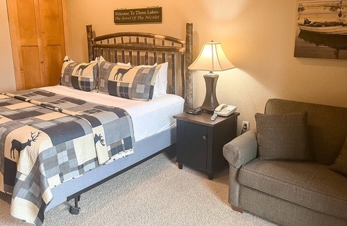 Three Lakes Condo | Lake-view studio with hot tubs, heated indoor pool, tennis, gym, grills, firepit