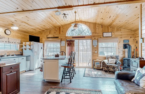 Greenville Junction House | Lake-view two-story home with beach access, wood stove, grill, W/D, & fast WiFi