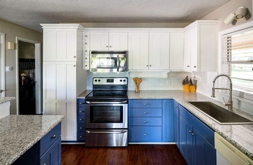 Cedar Creek Reservoir House | Lakefront 4 bedroom retreat w/boatdock/party deck, kayaks and outdoor bar.