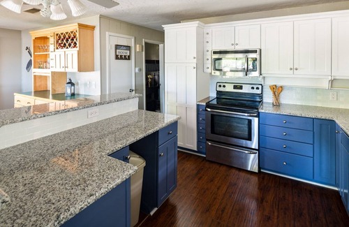 Cedar Creek Reservoir House | Lakefront 4 bedroom retreat w/boatdock/party deck, kayaks and outdoor bar.