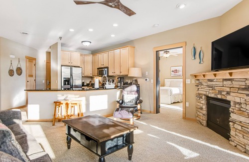Three Lakes Condo | Lakefront, ground floor condo with indoor pool - fireplace, patio & washer/dryer