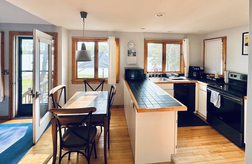 Traverse City House | Lakefront Home 4bdrm 2bath Dock & Deck WiFi AC Traverse City & Interlochen Art+
