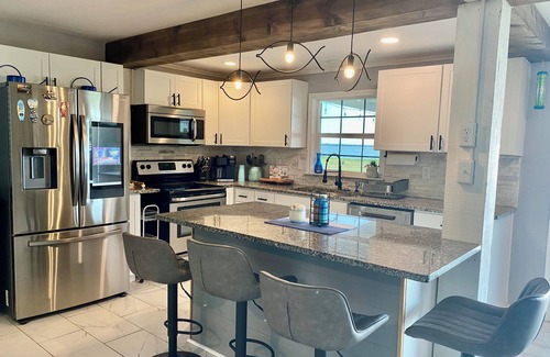 Kemp House | Lakefront home with Gorgeous sunset view