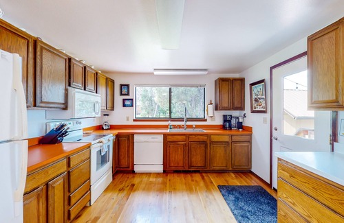 Big Arm House | Lakefront home with private beach, dock, firepit, & grill - dazzling sunset view