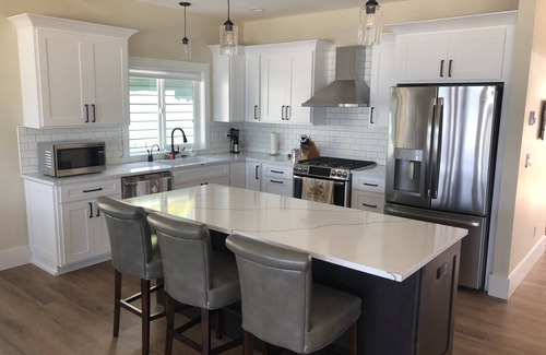 Coolin House | Lakefront house, right on a beautiful white sandy beach at Priest Lake