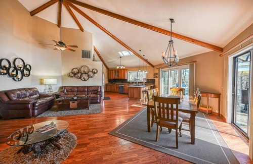 Bumpass House | Lakefront retreat with a dock, waterfront kitchenette, firepit & hot tub