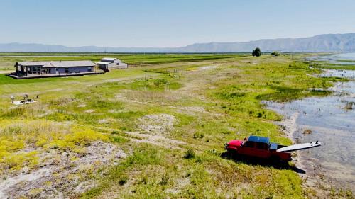 St. Charles House | Lakeside Oasis with Mountain Views