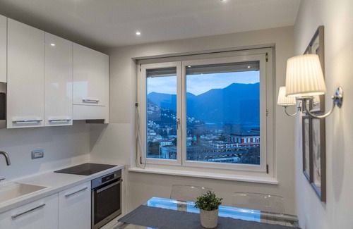 Lugano Apartment | Lakeview Panorama Penthouse with Washer, Dryer & super fast Internet