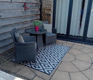 Wykeham House | Larch Cottage Ruston with hot tub, dogs go free