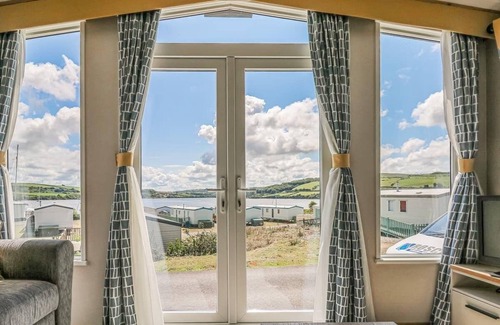 Cardigan House | Large 12ft-wide caravan with one double with en suite W.