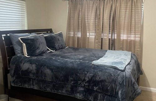Ashley Oaks House | Large bedroom with full bath and walk in closet